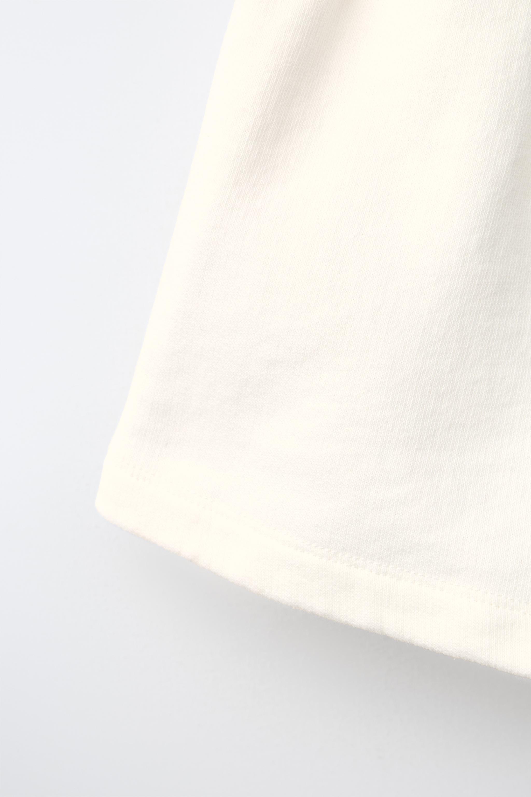 CONTRAST PIPING TEXT SHORTS